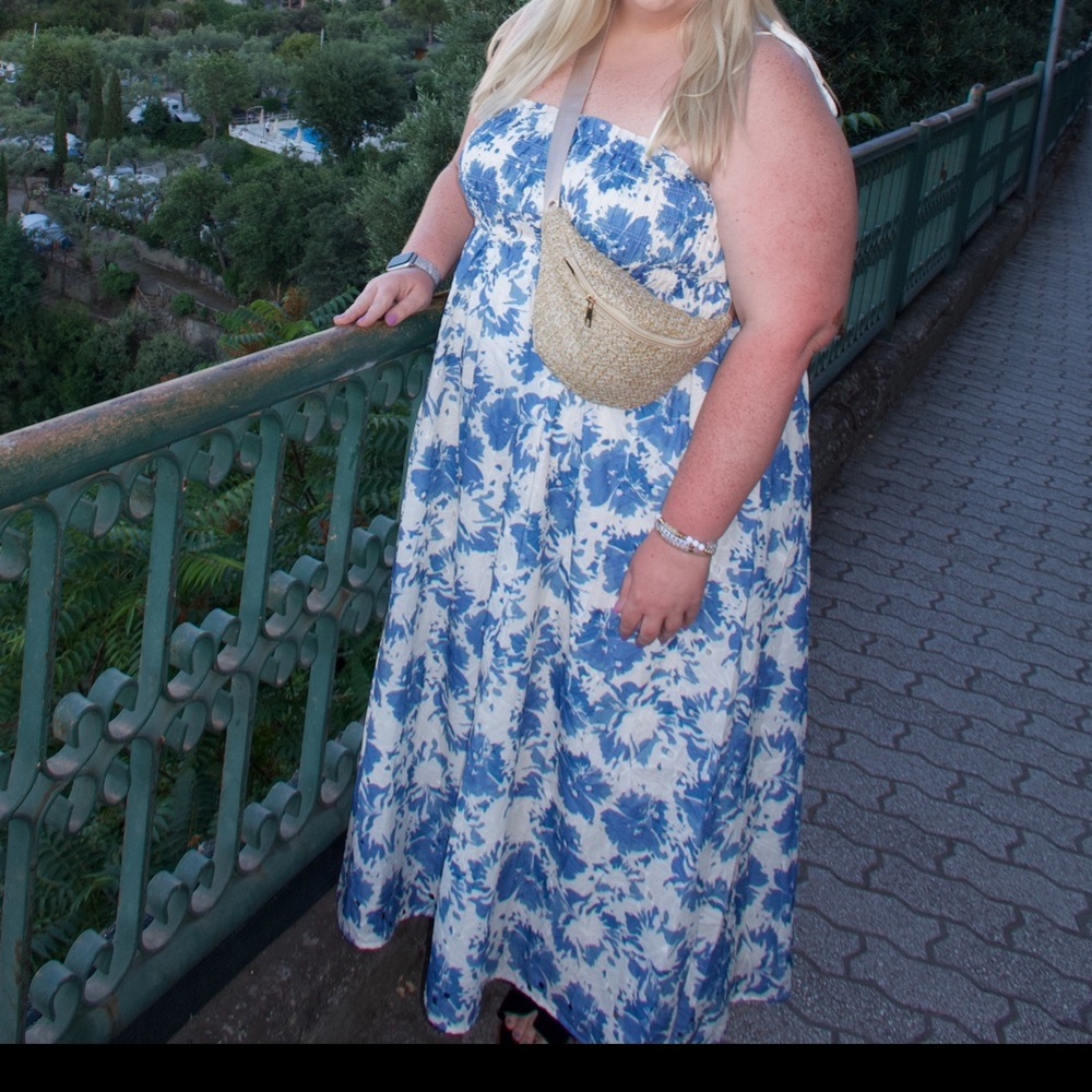 Secret Garden Smocked Floral Midi Dress &
Sold by Whiskey Darling